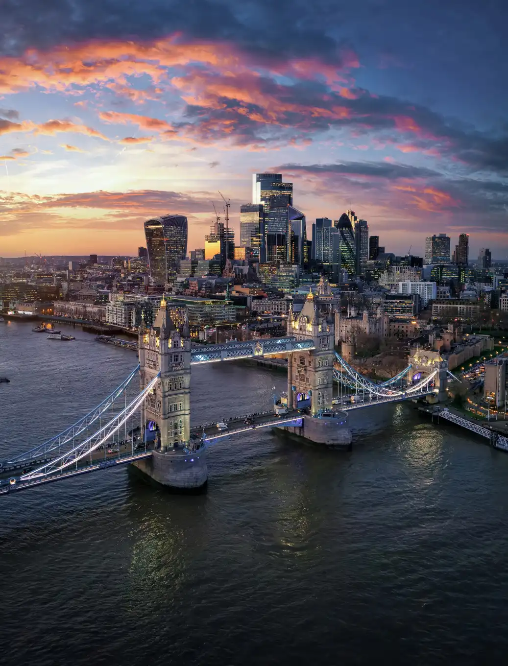 Aerial view of a global financial city at dusk