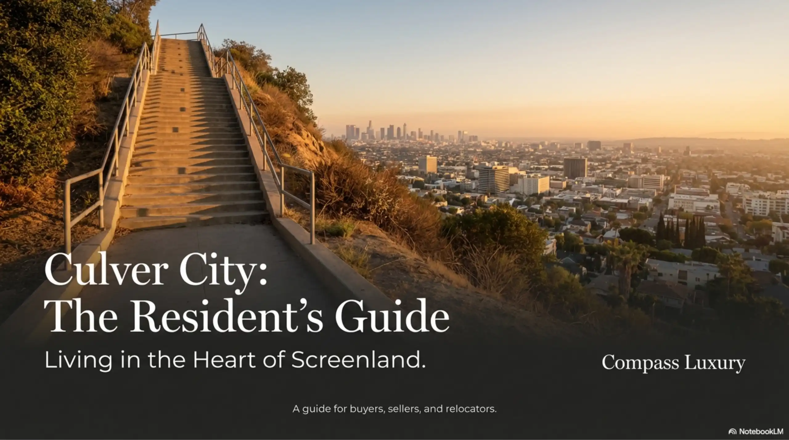 Concrete stairs leading up a hillside with a view of the Los Angeles skyline at sunset.