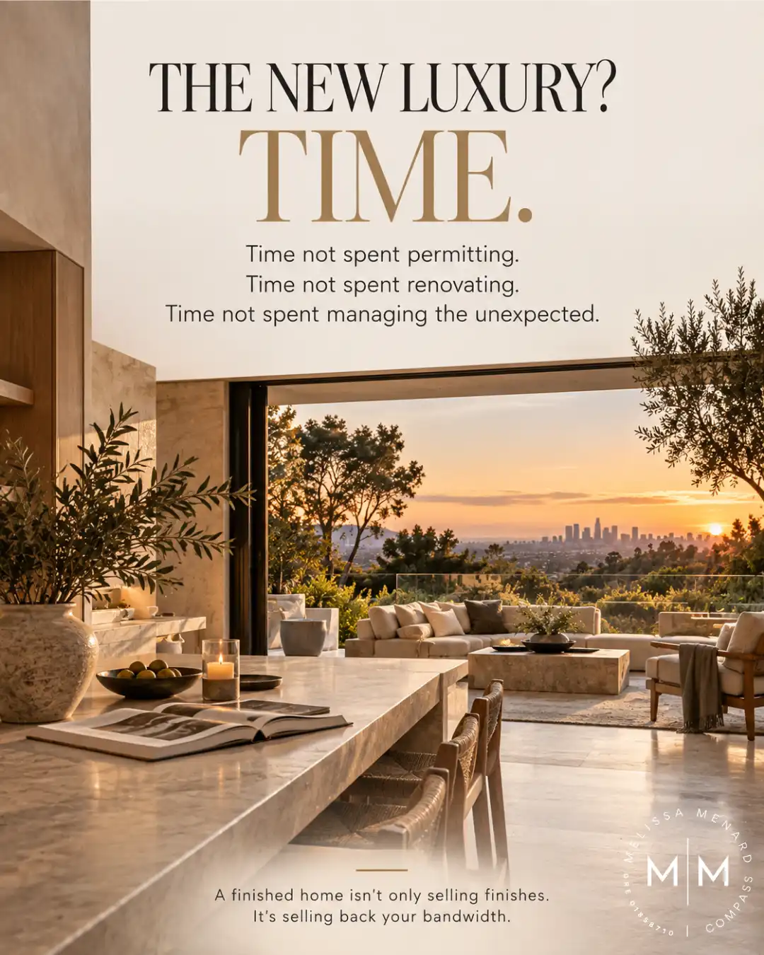 Kitchen with a stone island and open sliding doors showing a sunset city skyline with text about the luxury of time.
