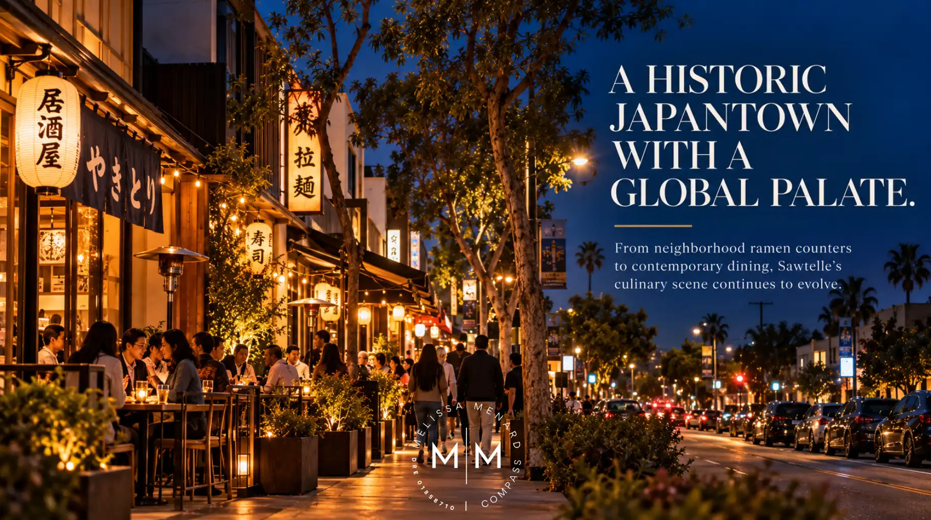 Commercial street with outdoor dining patios, Japanese lanterns, and storefronts at twilight.