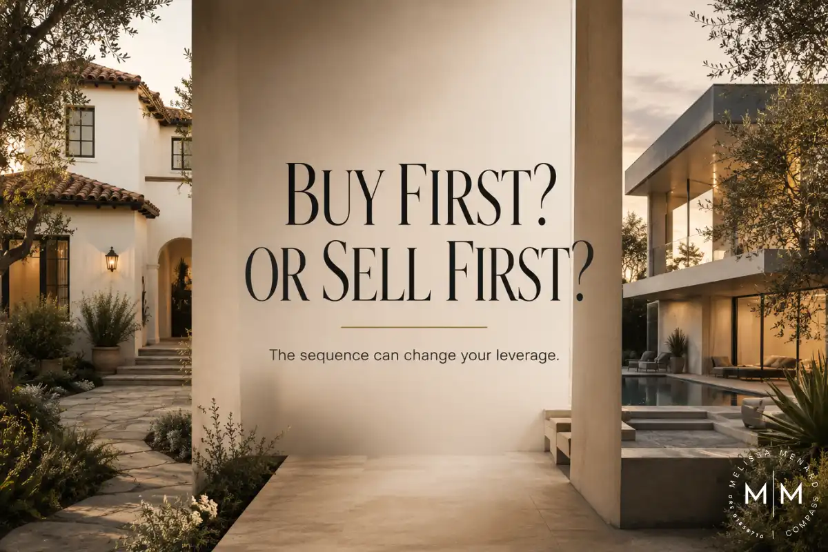 Text graphic reading "Buy First? Or Sell First?" on a central vertical white stucco pillar. On the left side, a traditional Spanish-style home exterior with white stucco, terracotta roof tiles, and an irregular flagstone walkway. On the right side, a contemporary two-story home with large floor-to-ceiling glass windows, a flat roofline, and a rectangular swimming pool with stone coping.