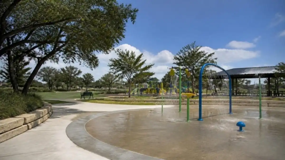 Splash pad and playground at a park in Hutto, Texas, an Austin suburb
