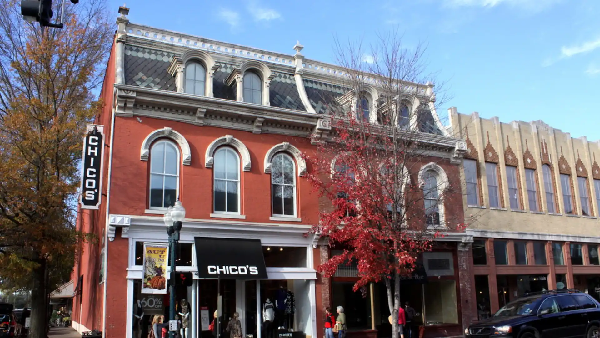 Historic downtown Franklin, Tennessee street scene with charming brick storefronts and fall foliage.