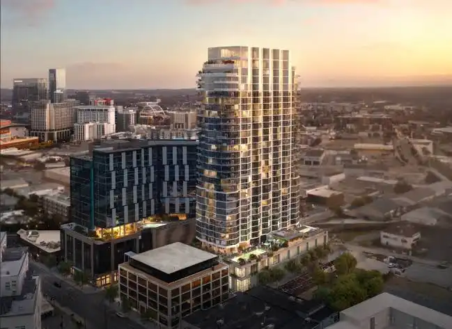 Aerial rendering of the Pendry Residences Nashville 30-story tower at sunset in the Paseo South Gulch neighborhood of The Gulch Nashville