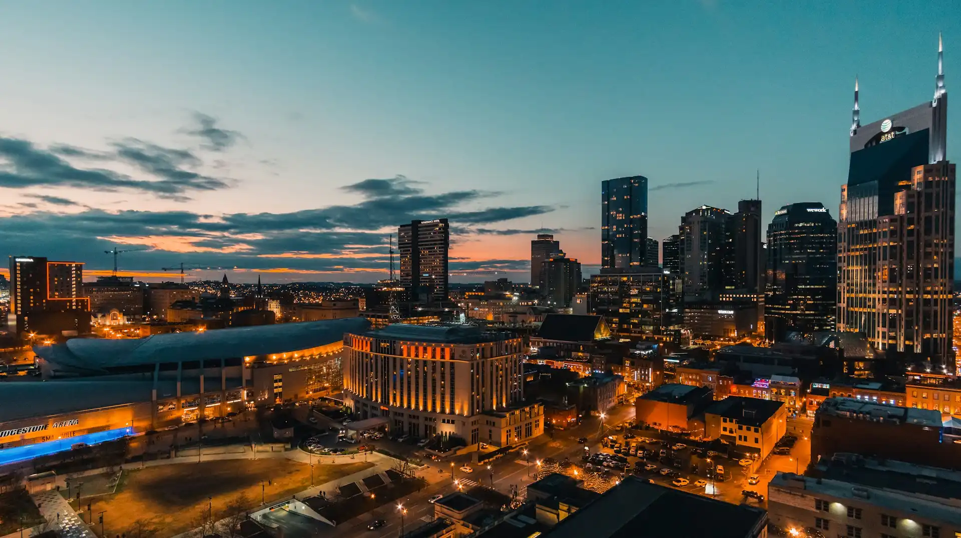 The downtown Nashville skyline glowing at dusk