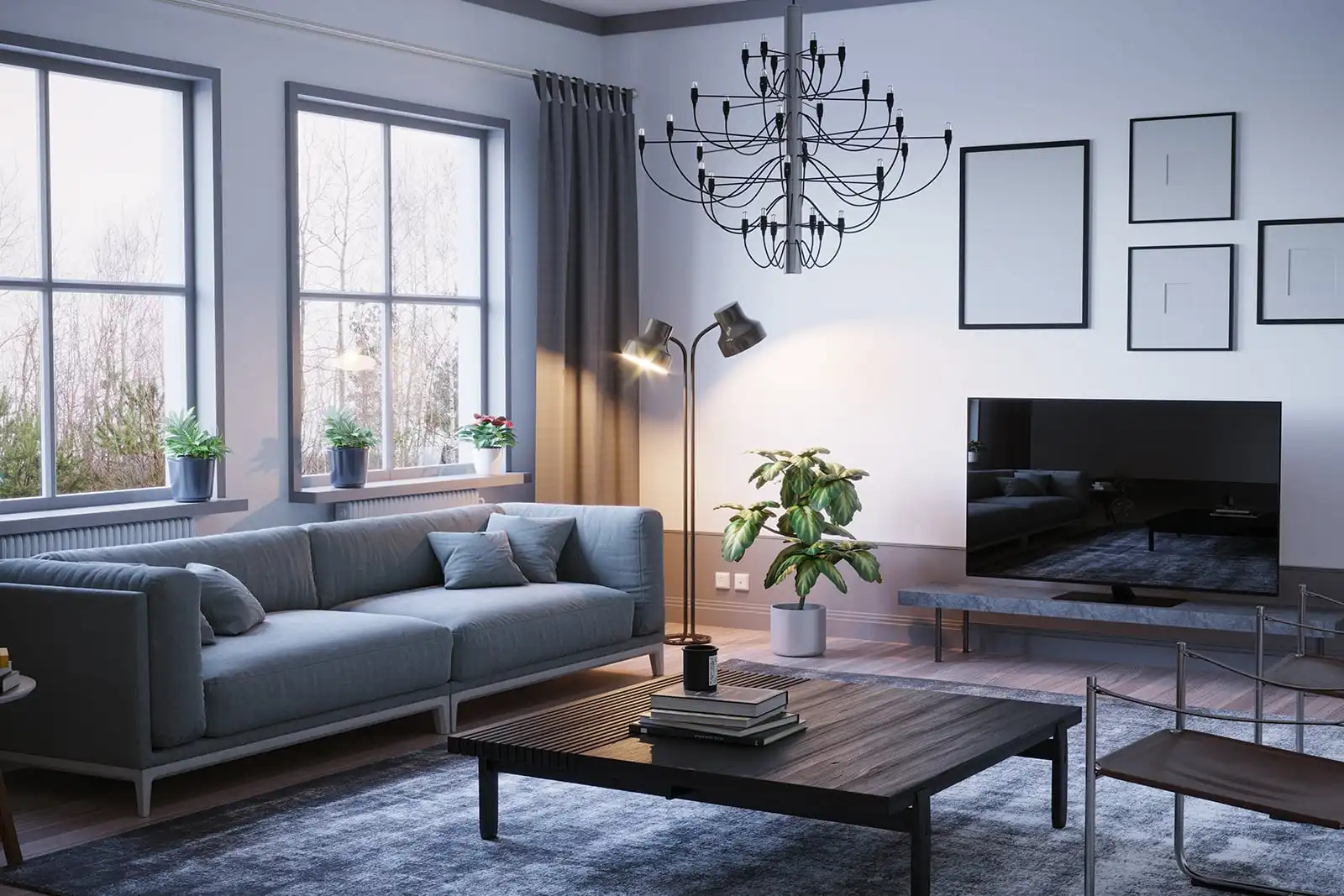 Living room with tall windows, a chandelier, seating and a television