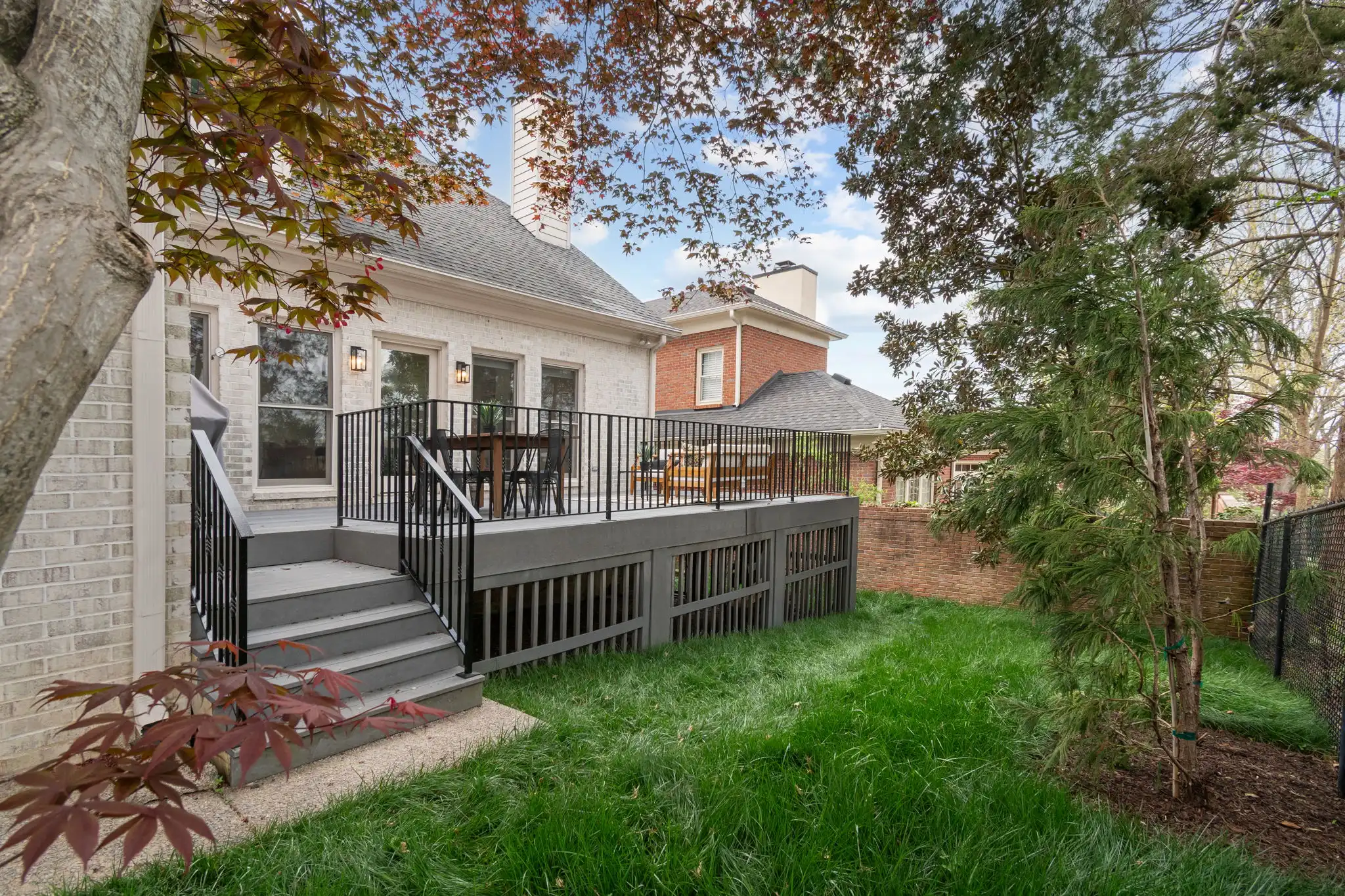 The Jernigan Group's listing 806 Foster Hill in Green Hills has a shaded backyard and private patio.