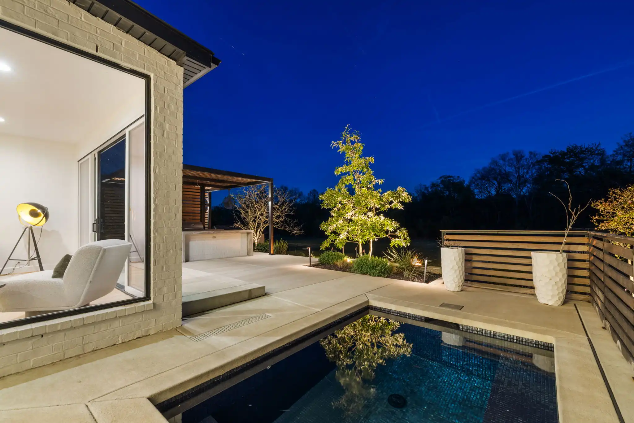 The Jernigan Group's listing 343 B Gillette Dr has a private pool, outdoor kitchen, and putting green.