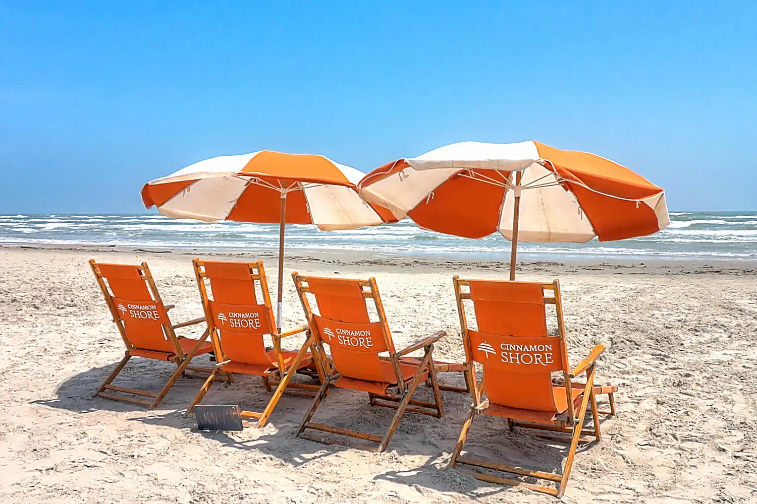 beach chairs umbrellas port aransas cinnamon shore